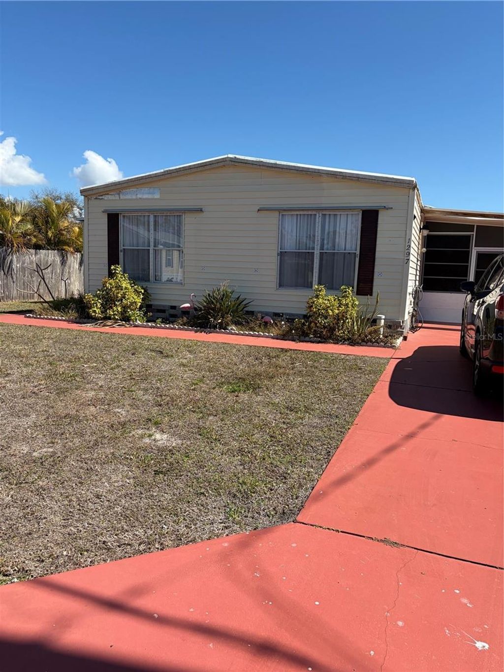 Photo of 1297 Kingfisher Drive, Englewood, FL 34224 (MLS # D6146298)