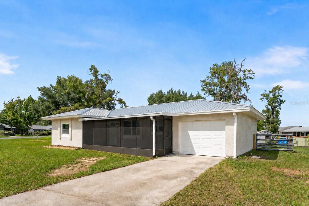 Photo of 566 Silver Course Radial, Ocala, FL 34472 (MLS # OM725765)