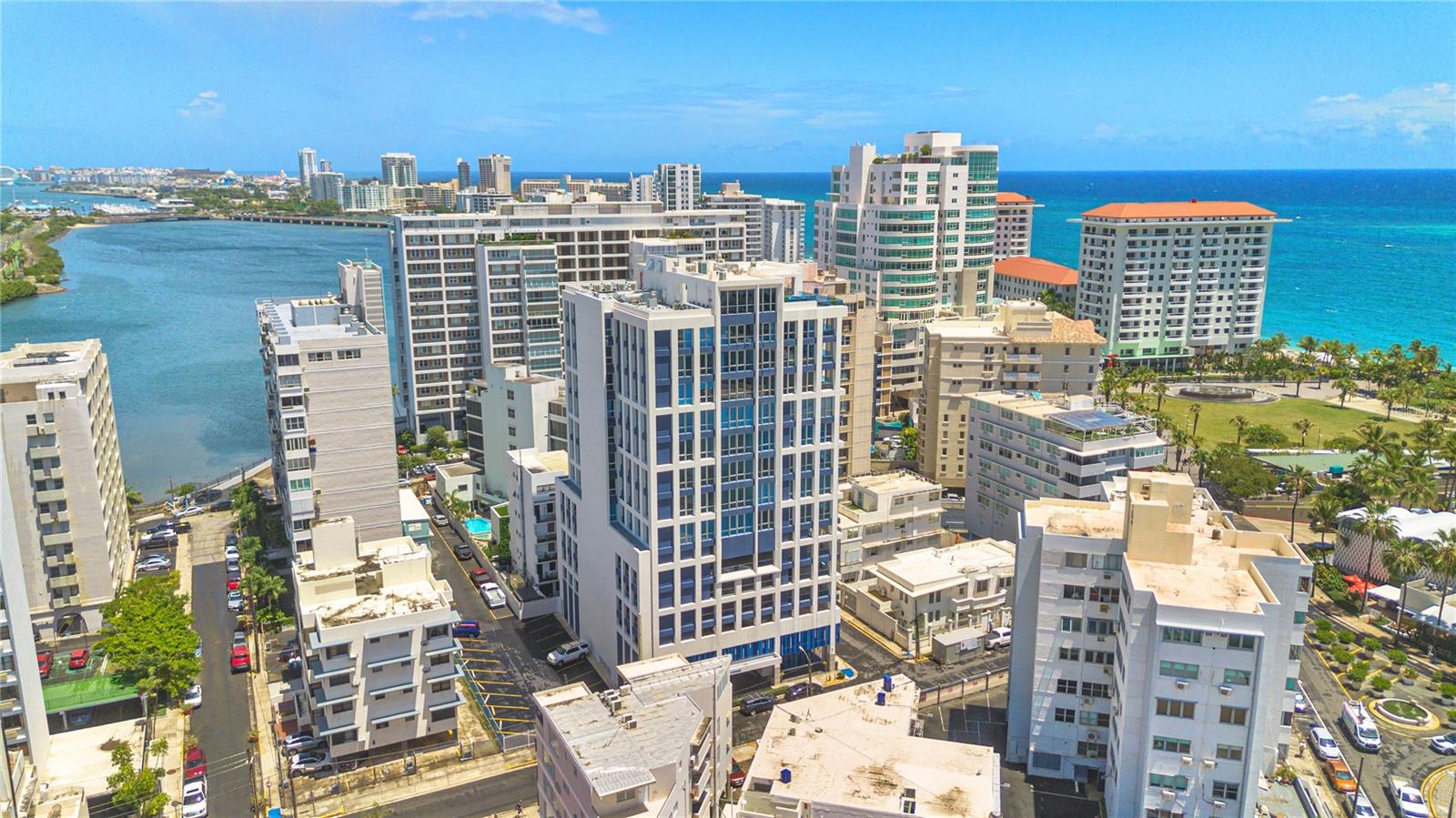 Welcome to a brand-new luxury rental in the heart of Condado, just steps from Ashford Avenue, La Ventana al Mar, and the iconic Vanderbilt Hotel. This beautifully designed two-bedroom residence offers an unmatched living experience with panoramic views, premium amenities, and a prime location.
Inside, you'll find a light-filled space with soaring ceilings and an open-concept kitchen, perfect for both entertaining and everyday living. The apartment is fully furnished with high-end finishes and stylish decor, offering ocean and lagoon views from every room. The spacious layout includes two well-appointed bedrooms, generous storage, and modern appliances.
Beyond the apartment, residents enjoy access to an impressive suite of luxury amenities. Relax on the rooftop terrace with sweeping city and ocean views, unwind in one of two outdoor jacuzzis, or explore the private wine cellar. Stay active in the fully equipped gym, and enjoy the convenience and personalized service of full-time concierge support.
This is a rare opportunity to live in a newly constructed residence that blends resort-style comfort with the vibrant energy of Condado. Walk to the beach, dine at world-class restaurants, and experience the best of San Juan—right outside your door.
Now leasing for move-in on October 15, 2025