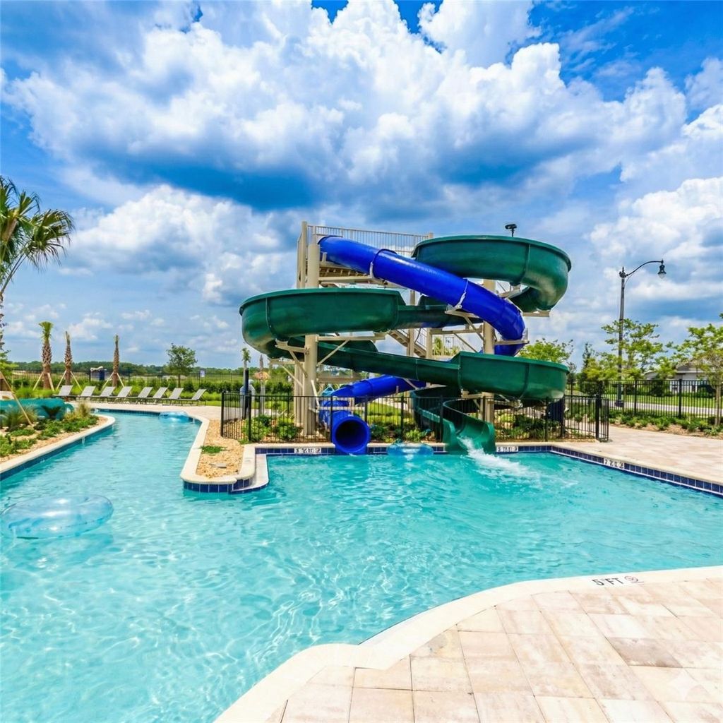 Photo of 3151 Paradox Circle #401, Kissimmee, FL 34746 (MLS # O6378222)