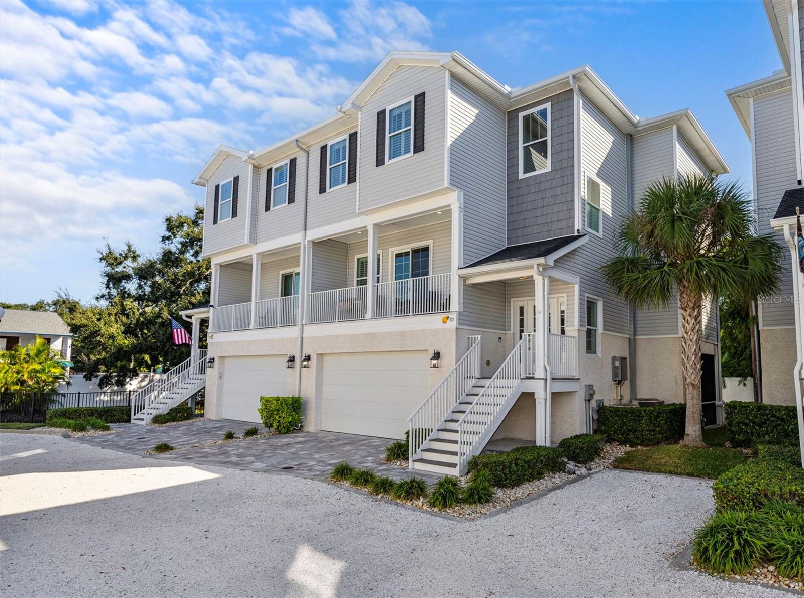 In the heart of Downtown Dunedin, perfectly placed among its most walkable and desirable streets, this townhome captures the best of coastal living and effortless style. Just a short stroll from the waterfront, Main Street’s cafés and boutiques, the Pinellas Trail, and the Blue Jays Ballpark, it offers a lifestyle that’s vibrant, connected, and unmistakably Dunedin.
Every element reflects thoughtful craftsmanship and refined taste. The kitchen features new, upgraded appliances, custom cabinetry with pull-out drawers for smart storage, and fresh quartz countertops—all set within a bright, open layout that blends seamlessly into the home’s modern design. Throughout the home, curated finishes, coastal shutters, custom closets, and design-forward details speak to both quality and intention, while tongue-and-groove ceilings in the inviting outdoor spaces add warmth and character. A new tankless water heater and whole-home filtration system complete the list of thoughtful updates designed for everyday comfort and efficiency.
The main living area opens to a breezy balcony—perfect for morning coffee or sunset gatherings—while the lower-level suite offers a private retreat for guests or in-laws with its own lanai and newly extended patio pavers. Upstairs, the primary suite is joined by two additional bedrooms and a versatile loft ideal for an office or cozy den.
Thoughtfully designed with future flexibility in mind, the home includes an existing elevator shaft currently used as generous closet space—offering both function today and adaptability for tomorrow.
With hurricane-impact windows, coastal architecture, and timeless design inside and out, this home offers effortless living and enduring style in the heart of Dunedin. Be sure to explore the VIDEO TOUR and request the FULL UPGRADE LIST—this is a rare opportunity to own a beautifully finished home in one of Downtown Dunedin’s most coveted locations.
