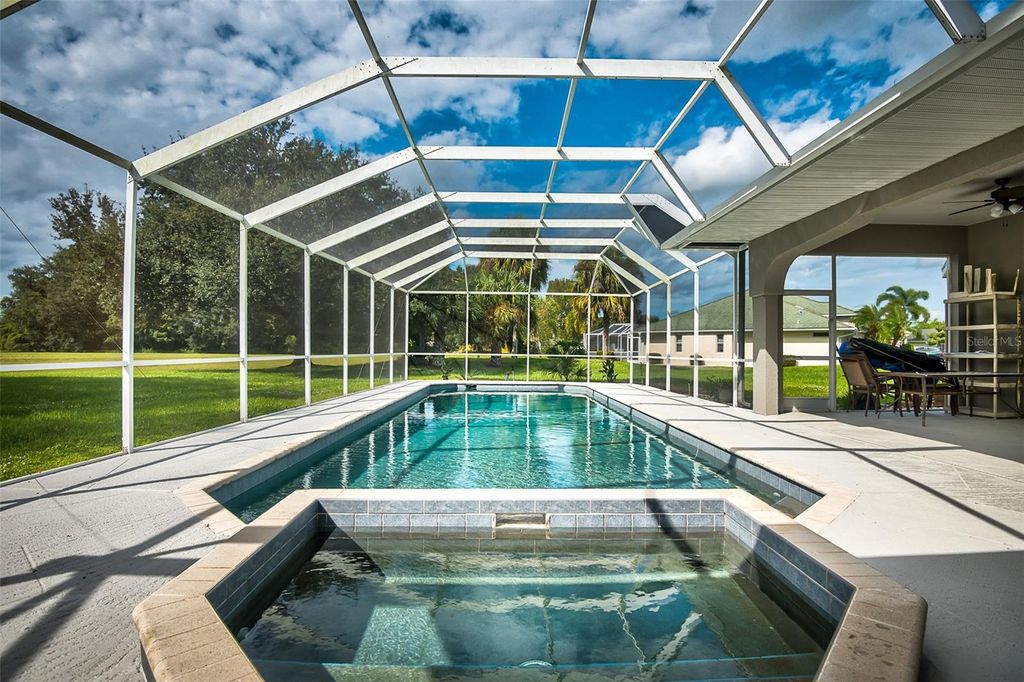 Photo of 27406 Tierra Del Fuego Circle, Punta Gorda, FL 33983 (MLS # C7469962)