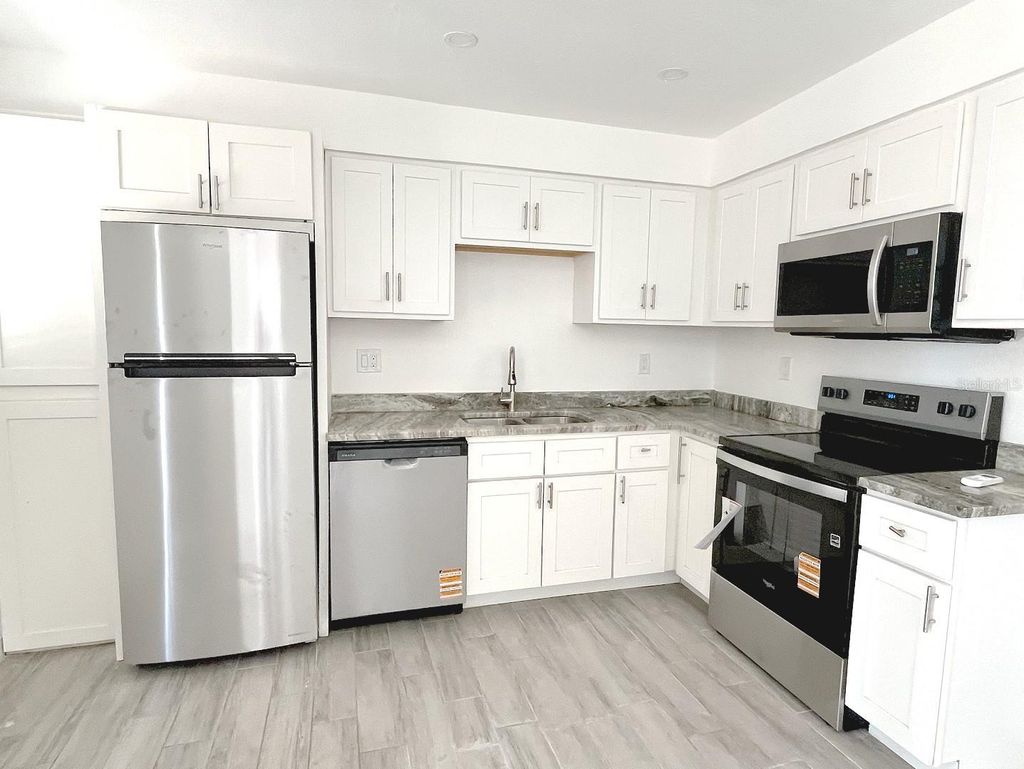 Photo of 24 Lynn Way #24, Madeira Beach, FL 33708 (MLS # TB8493615)