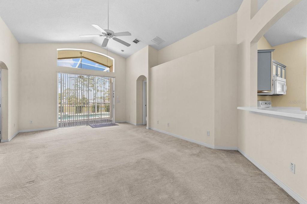 Photo of 1115 Troon Cir, Davenport, FL 33897 (MLS # O6390376)