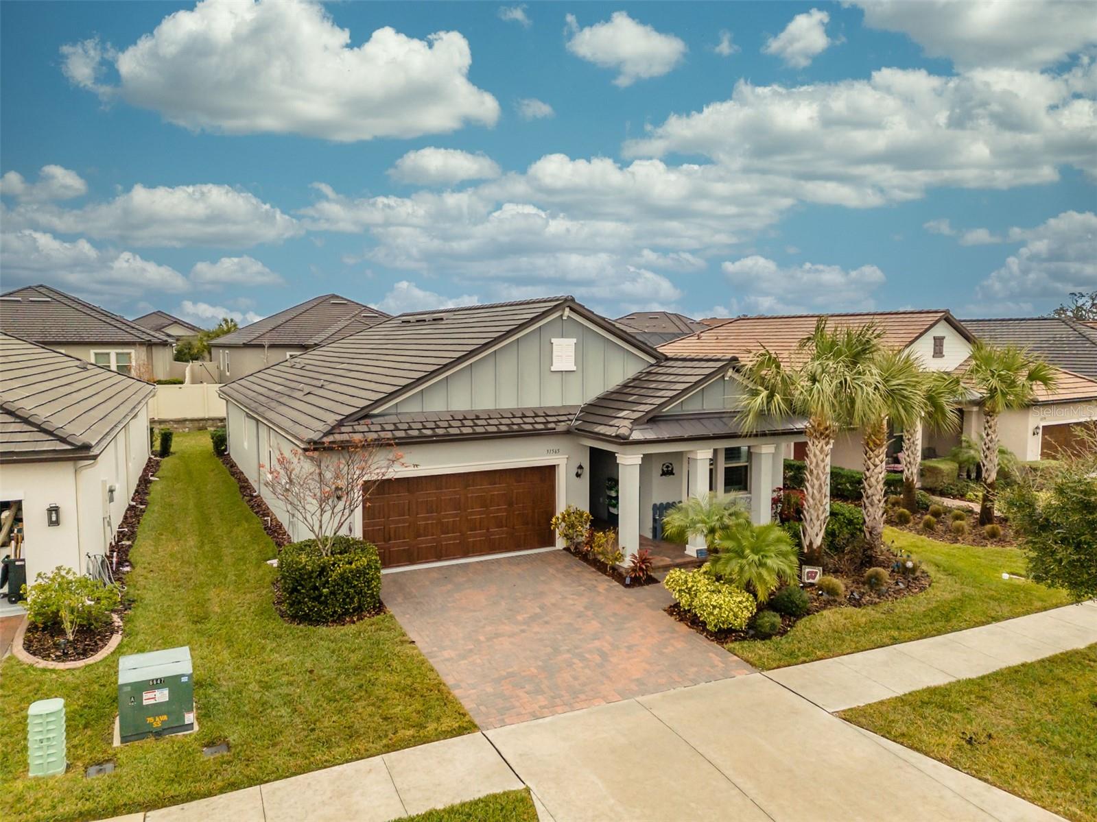 ACT QUICK, ON MARKET UNTIL OCT 10. Peaceful water views right across the street! Equipped with oversized & enclosed lanai, 2-car garage with extra space for a golf cart, and all within San Antonio’s popular & privately gated Medley at Mirada (55+ community). Nearly 3,000sf of total living space - highlighted by bonus Flex Room (3rd bedroom/home office option), plantation shutters, and crown molding in nearly every room. **Laundry room – larger than most!** Terrific natural lighting with an abundance of double-pane windows & accordion sliding glass door. Kitchen includes grey herringbone backsplash, beautiful granite countertops, a walk-in pantry, and of course new stainless-steel appliances. Kitchen flows seamlessly into the diagonal-tile living room with custom blue accent wall & an easy transition leads to the outdoor lanai for many days and nights of relaxation and/or entertaining. Gutter system upgrade & water softener included. The HOA dues are PACKED with value with high-speed “UltraFi” internet, TV (250+ channels), landscaping, and Crystal Lagoon access included. The benefits continue with access to Medley’s own resort-style heated pool and amenity center with full service café & bar. The list goes on… 24hr fitness center, pickleball, tennis, bocce ball, billiards, a card room, ballroom, shuffleboard, dog park, and a tot lot playground for any visiting family. The 15-acre lagoon includes swim up bar, sandy beaches, cabanas, water slide, water splash zone, kayaking, and water obstacle course. Prior to the community’s grand winding entrance stands a Publix shopping center with popular golf courses & hospitals just a short drive away. Access to I-75 is only a 5-minute drive. This is an opportunity that will only last for 30 days so inquire today to learn more!