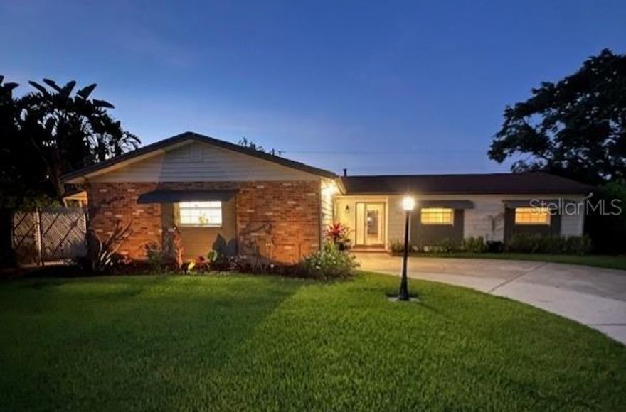 Enjoy the Winter Park Lifestyle with this Beautiful 4 Bedroom Poolside Home. The Entire Interior is New, Furnished and Move-in Ready! Entertain in style with a Large Eat-In Kitchen, Stainless Steel Appliances, Soft-Close Cabinetry and Quartz Countertops. Open Floorplan with Entryway into the Living and Dining area that overlooks your Screen-Enclosed Pool/ outdoor Living Space with a Fenced Yard.  Versatile Flex Space perfect for a Home-Office, Entertainment Room, or cozy Family Retreat. Three Bedrooms on one side of the house with a Huge Tranquil Master Suite on the other side. Indulge in the Oversized Walk-In Steam Shower, Custom Double Sinks with Backlit Mirrors and Double Closets in the Dressing Area. Master Suite has a Real Fireplace and Pool access through Sliding Glass Doors. Luxury Vinyl Plank Flooring and Fresh Paint throughout. Elegant Designer Wall and Floor Tiles in the Bathrooms with New Sinks, hardware, and faucets. Newer Roof (2021). Light and bright. This home is a gem. The floorplan must be seen to be appreciated. This home is nestled on a Quiet tree-lined street, near top-tier restaurants, businesses, shopping, parks, recreation, top rated schools, and Park Avenue only 4 miles away. Two Workshop/Sheds for storage and creative projects in the back yard. Schedule your private tour today!