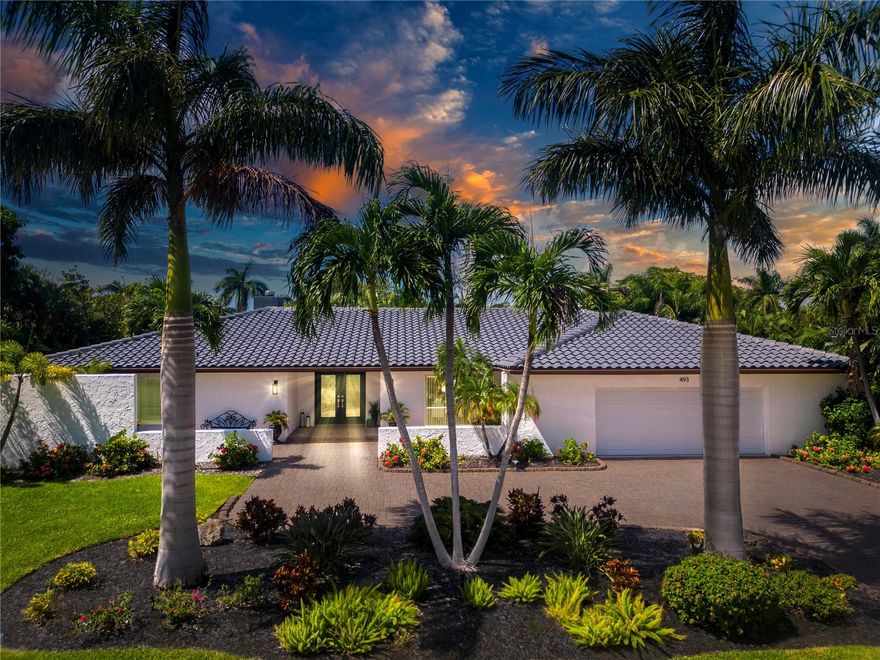 Nestled on a peaceful street in the prestigious and highly sought-after Bird Key neighborhood, this spacious garden home is a hidden gem. Surrounded by lush, mature landscaping, paved driveway, and a two-car garage, this single-story 5-bedroom, 3-bathroom ranch home offers a slice of paradise in the heart of Sarasota. The interior of this home boasts an open-concept split floor plan with well-defined, flowing areas that include both a family room and a living room, making it ideal for modern living. The open-plan kitchen features granite countertops with an island seamlessly opening to the family room, both overlooking the expansive private backyard and inviting pool area. The remarkably large master suite features a spacious master bedroom with a walk-in closet and a generously sized en-suite bathroom. Guests and family are welcome in this generously sized home with two guest bedrooms and a bathroom thoughtfully placed on one side of the house, and another two bedrooms and a bathroom on the opposite side, ensuring privacy and separation for all. This home is one of the largest single floor ranch homes on the Key and the lowest price per sf. Hurricane impact windows have been ordered and are soon to be installed throughout the entire house, ensuring safety and security. Living on Bird Key means enjoying the convenience of a fantastic location. You're just a stone's throw from Sarasota's stylish downtown, offering fine shopping, world-class dining, cultural activities, and theaters. For beach lovers, the sandy shores of Lido Beach are nearby, as well as the dining and shopping options at St. Armand Circle. Plus, this home is within an easy walk, bike ride, or drive to the Bird Key Yacht Club, with its own social activities, tennis, fitness facility, pool, dining, and marina. Don't miss this opportunity to own a piece of paradise on Bird Key.