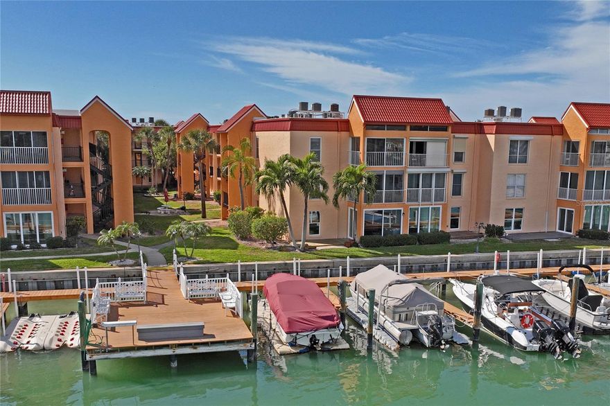 Beautifully updated waterfront condominium located within a gated community in sought-after St. Pete Beach. This third-floor residence is positioned just steps from the Intracoastal Waterway and offers views overlooking the landscaped courtyard with the waterway immediately beyond.
The community permits rentals, making the property suitable for personal or rental use.
The unit has been well maintained and interior features include an open living and dining area with cathedral ceilings and ceramic tile flooring throughout. The bedroom is generously sized with a walk-in closet. No climbing stairs, as elevator access provides convenient entry and access.
The kitchen has been thoughtfully updated with granite countertops, custom cabinetry, and appliances replaced, including the stove and dishwasher. The bathroom features a large walk-in shower with a glass enclosure, updated vanity, and newer plumbing fixtures. A recent addition is the tankless water heater, adding efficiency. The interior has been recently painted and presents in clean, move-in-ready condition.
Boca Shores offers a relaxed waterfront setting with maintained landscaped grounds and a pool positioned directly along the Intracoastal, creating an inviting environment for swimming, sunning, or enjoying the activity along the waterway. Additional community amenities include a clubhouse, fitness room, outdoor grilling and picnic areas, kayak and bicycle storage. Boat slips are available for lease through the association on a first-come basis, subject to availability.
St. Pete Beach is a vibrant Gulf Coast community located on a barrier island west of St. Petersburg, known for its prefect sand beaches, clear Gulf waters, and memorable sunsets. Nearby destinations include Pass-a-Grille Beach and Upham Beach Park, along with a variety of water and outdoor activities such as boating, paddle-boarding, kayaking, parasailing, and dolphin watching. The area also offers access to natural preserves and coastal parks. Local attractions include the historic Don CeSar Hotel, the Pass-a-Grille district, the seasonal Corey Avenue Sunday Market, and a wide range of waterfront dining and beachside restaurants.