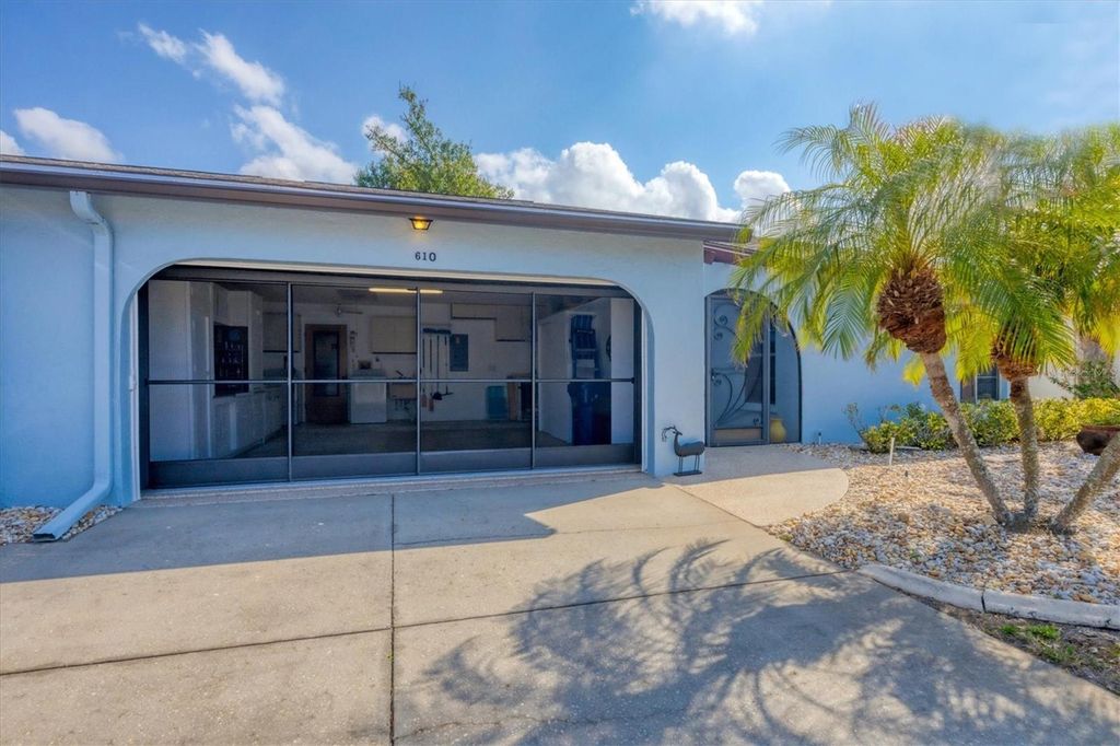 Photo of 610 Apple Lane, Englewood, FL 34223 (MLS # D6143954)