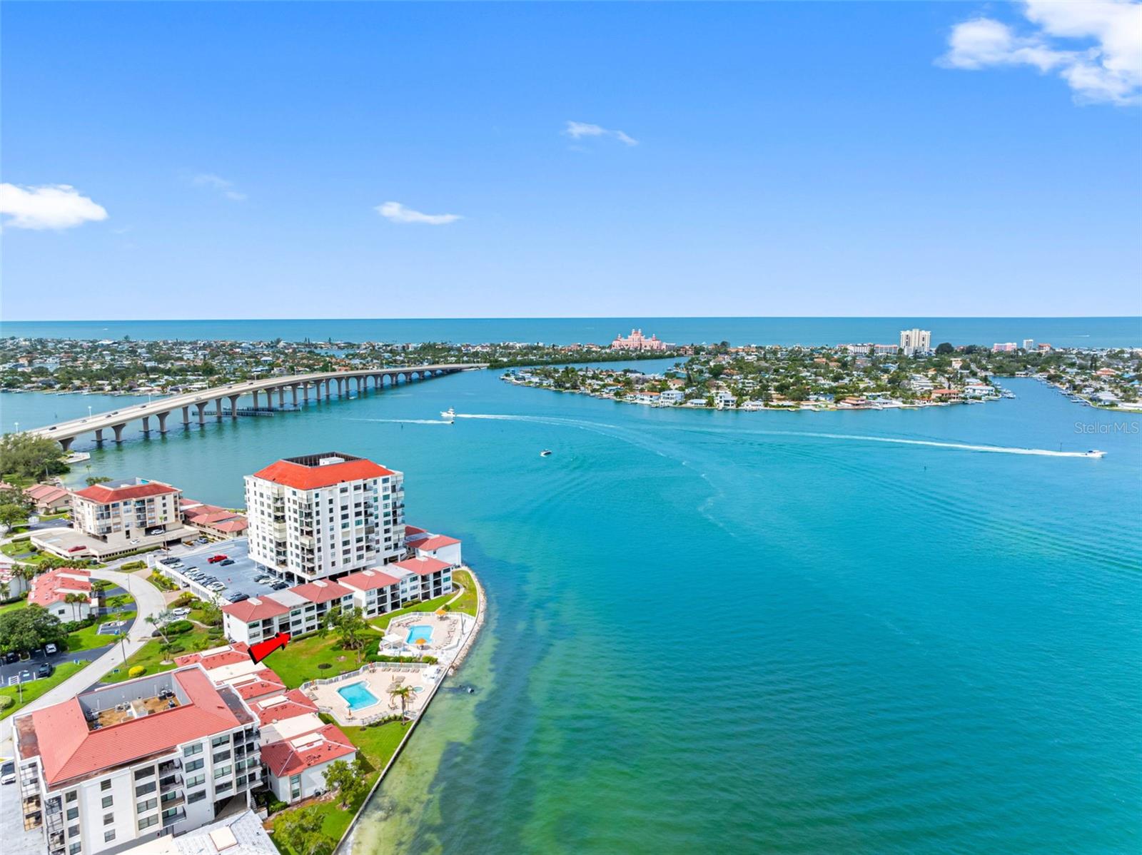 LUXURY WATERFRONT LIVING—DESIGNER FINISHES, POOL, SUNSET AND BOAT WATCHING VIEWS!
Step into this FULLY remodeled, TURNKEY 2-bedroom, 2-bath home where no corner was cut and no inch spared. This first-floor residence offers high-end finishes, PREMIUM furnishings, and a front-row seat to PARADISE—with sweeping views of the heated pool, lush landscaping, passing boats, and vibrant northwest sunsets over the Intracoastal waters of Boca Ciega Bay.
From your screened-in patio—complete with a tiled floor and private storage closet—you’re just steps away from the pool, spa, and scenic waterfront walking path. Watch the mega yachts as they make their way out to the Gulf! Inside, the chef-inspired kitchen features white Shaker-style soft-close cabinetry with modern hardware, marbled quartz countertops, stainless steel appliances, recessed lighting, and abundant storage. There’s room for an eat-in breakfast table, coffee bar, or modern kitchen hutch if desired.
The open layout flows seamlessly from kitchen to dining to living room, where large sliders frame the water, boats, and tropical scenery beyond. The dining area offers space for family gatherings, entertaining, and even a large, stylish sideboard with storage—a sure conversation starter!
The primary suite boasts gorgeous pool and water views, a generous walk-in closet, and a spa-like ensuite with premium designer finishes. Enjoy a quartz countertop vanity and a frameless glass walk-in shower with designer hexagon tile flooring, a custom tile inset, and a built-in bench seat. The split-bedroom plan ensures privacy for guests, with the second bedroom located beside the updated guest bath. A separate laundry room includes a new washer/dryer. Throughout the home, you’ll find smooth ceilings, new high-quality flooring, solid-core doors with nickel hardware, and updated lighting and WINDOW COVERINGS.
Have peace of mind with hurricane shutters on all windows and the patio, a 2024 HVAC, and the convenience of ground-level assigned covered parking (#148)—no elevator needed.
Offered fully furnished with top-grade furniture, cookware, bedding, and décor, this property is truly move in or rental turnkey ready. According to AirDNA’s Rentalizer, it could generate $44,000 annually at 73% occupancy, making it an excellent investment, full-time residence, or vacation getaway.
Life here feels like a resort every day—with the option to join the Isla Del Sol Yacht & Country Club, offering golf, clay tennis courts, pickleball courts, yacht, or social memberships, all just a short stroll away. You’re minutes to Fort De Soto and St Pete Beach's award-winning beaches, the charm of Pass-a-Grille, and the vibrant restaurants and nightlife of downtown St. Petersburg. Easy access to I-275 gets you to Tampa International Airport in under 30 minutes.
The “Island of the Sun” is golf cart-friendly, with peaceful streets lined by mature banyan trees and the cheerful songs of wild green parakeets. Schedule your private showing and experience the perfect blend of coastal luxury, boating activity, and breathtaking sunsets.