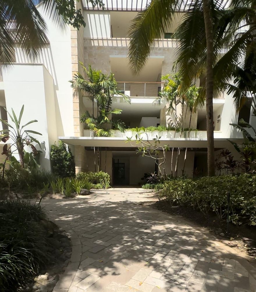 Introducing West Beach, a Ritz Carlton Reserve Residence that redefines coastal luxury, offering an unparalleled beachfront living experience in Dorado, Puerto Rico. This remarkable condo, nestled along the pristine shores of Dorado Beach Resort, provides a rare opportunity to indulge in a captivating blend of serene natural beauty and contemporary elegance. Step into your private sanctuary and immerse yourself in the soothing ambiance of this meticulously crafted residence. The spacious open-concept floor plan seamlessly connects the living, dining, and kitchen areas, creating an ideal space for entertaining guests or enjoying quality time with loved ones. Large floor-to-ceiling windows invite an abundance of natural light, illuminating the stunning interior and offering captivating views of the azure ocean beyond. The gourmet kitchen, a culinary enthusiast's dream, features top-of-the-line Wolf and Sub-Zero appliances, custom Poliform cabinetry, and an expansive island with sleek countertops, providing both functionality and style for casual meals or lavish dinner parties. The master suite serves as a tranquil oasis, offering a private retreat to unwind and rejuvenate. Wake up to the gentle sound of waves and enjoy the sunrise from your own balcony. The en-suite bathroom boasts a luxurious spa-like atmosphere, complete with a deep soaking tub, a spacious walk-in shower, and an outdoor shower experience. Two additional bedrooms are thoughtfully designed to provide comfort and privacy for family members or guests, each tastefully appointed. Wake up to stunning ocean views or relax in the cozy reading nook, creating your own world of tranquility. Immerse yourself in the sheer beauty of beachfront living at West Beach, where every day brings a sense of tranquility, luxury, and endless possibilities. Don't miss the chance to own this exceptional property and create lasting memories amid the captivating beauty of Dorado Beach.