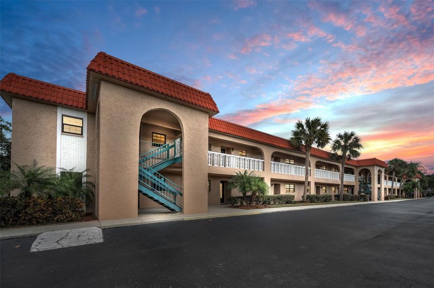 NEW PRICE!  This could be your new address for 2026! Bel-Forest Condominiums is home to this 2 bedroom/2 bath, second floor unit in the sought-after coastal community of Belleair. With close proximity to the sparkling Gulf, Pelican Golf Course, the exceptional Belleair Country Club, and world-class beaches, clean lines and plenty of fresh Florida sunshine define this lovely space. A beautiful bonus includes a stunning sunroom measuring 13’ x 6’ -- adding viable living space to the 1,068 square feet FEATURING pool and pond views. Sliders from both the living room and master suite provide entry to this all-purpose, multi-season alcove. The great room plan also provides a multitude of possibilities, while the eat-in kitchen is bright and welcoming. Both bedrooms are spacious and sunny, boasting walk-in closets, ceiling fans, and neutral carpeting. NEW commodes were installed in both baths. BRAND NEW windows in the sunroom were added this year. The community pool is flanked by chaise lounges and adjacent to an expansive, covered lanai; the perfect place to gather with neighbors to play cards or share laughs. Residents enjoy a same-floor laundry room and an assigned carport. No pets are allowed, nor is Bel-Forest a 55+ community. It is therefore open to anyone in pursuit of a little slice of paradise. This area is not in a flood zone. The adjoining Pinellas Trail’s 45 miles stretches from St. Petersburg to Tarpon Springs, and is THE destination for strolling, biking, or blading. Sunsets. Beach strolls. Fabulous restaurants and retail. Whether you seek a home away from home, are planning a retirement move, or just want to make a fresh start in an exquisite place, you will absolutely love this wonderfully maintained community.  Note – Seller prefers to include furniture in the sale of the condo.