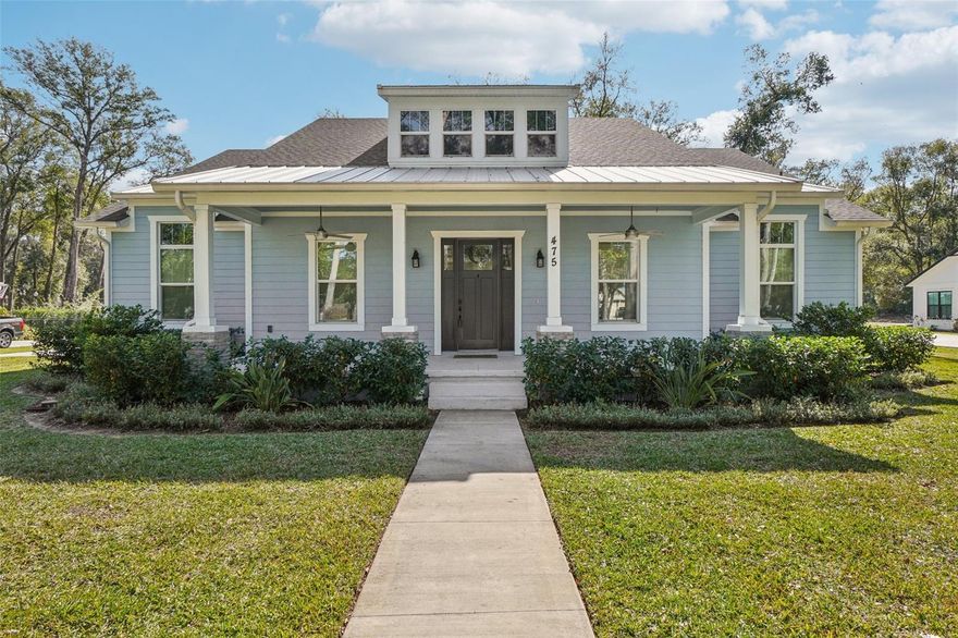 LAKE HELEN: WOODS OF LAKE HELEN NEIGHBORHOOD | FRONT AND BACK PORCH | OVERSIZED LOT | UPGRADES | NEW INTERIOR PAINT| SO MUCH CHARACTER: From the moment you pull up to this home you will be WOWED! Great curb appeal with the Front porch with fans and decorated beams AND Easy to maintain landscaping on an oversized .74 acre lot. The home boasts 4 bedrooms and 3 bath home offers 2275 SF. The Entry way leads you home and it is a bright space with all the natural light the home offers. The Living room has plenty of space to entertain and French doors lead to the Porch. The Gourmet kitchen offers modern shaker style cabinets with soft close drawers, gorgeous granite counters, upgraded stainless steel appliances, decorative backsplash and large pantry. The Dinette area off the kitchen is the perfect spot for family meals while enjoying the views of the backyard. The primary bedroom is large and has a ceiling fan to keep you cool, multiple windows and walk in closet. It also offers a beautiful En suite bathroom with stand alone soaker tub, walk-in shower and dual vanities. There is door access from the Primary bedroom to the porch. Additional bedrooms are spacious and there are 2 additional full bathroom. Some noticeable upgrades of the home: Stunning wood grain tile floors throughout, upgraded Kichler lighting and Moen faucets, attached 2 car garage. The yard has plenty of room for everyone to add a pool. Close to shopping, restaurants and minutes from I-4 for an easy commute. The community features a playground and sidewalks to enjoy a morning run or evening stroll. This home has everything you are looking for! Don't wait-make your appointment today to see all this home has to offer you! **The info in MLS is thought to be correct but not guaranteed**