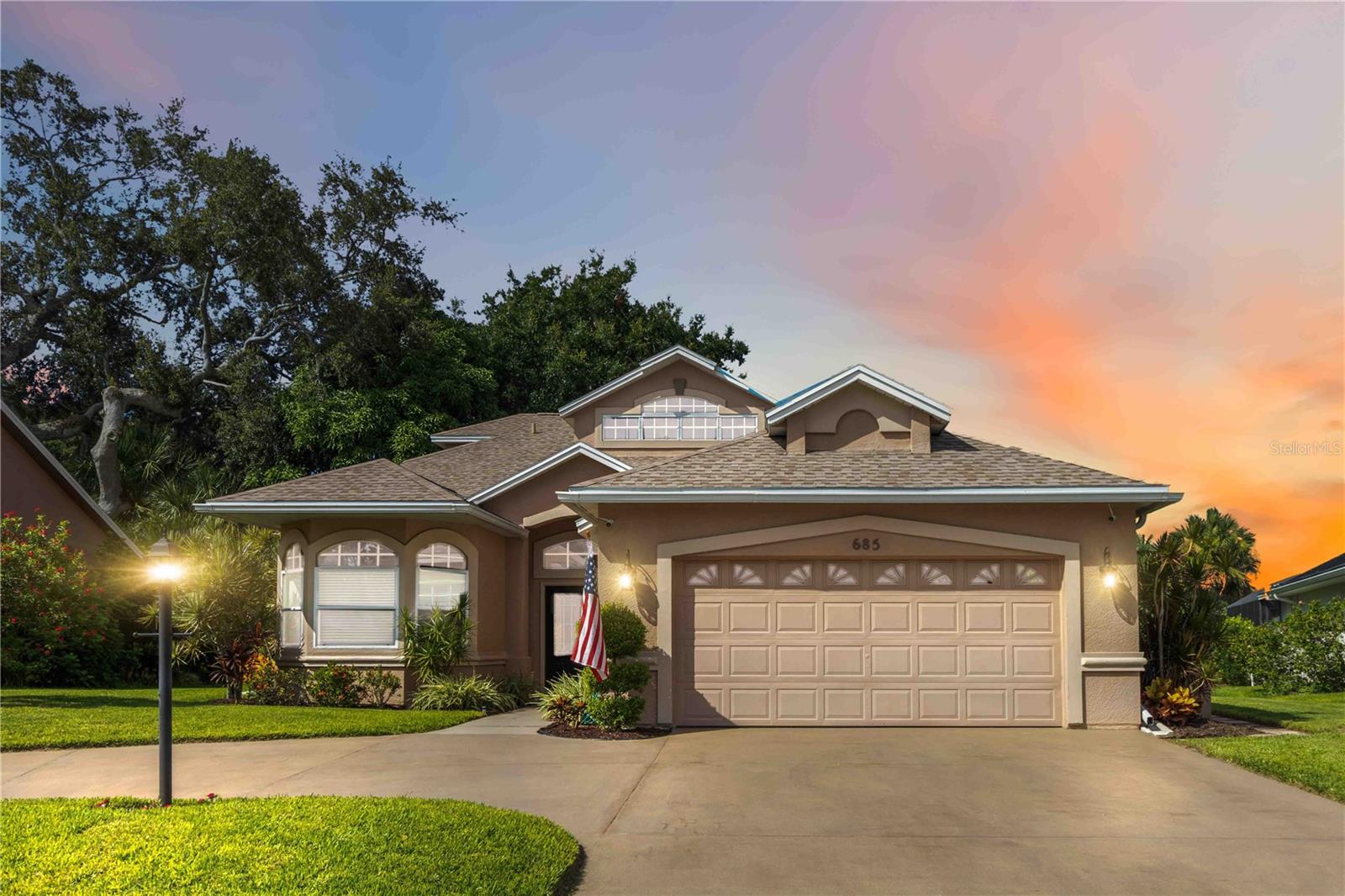 WATERFRONT STUNNER! Step into luxury in this beautifully updated executive home located in the desirable La Cita Country Club & Golf Course area! Large, open living areas with volume ceilings make this home ideal for entertaining. Gourmet kitchen is remodeled top to bottom, with granite counters, stainless appliances, solid wood cabinets, and a walk in pantry! A true chef's dream! Natural gas dryer, heating & hot water! 2 guest bedrooms, both with high ceilings, and full guest bathroom located downstairs, with a bonus room/den/4th bedroom as well and a half bath for guests. Upstairs features a luxurious primary bedroom suite with vaulted ceilings, large closet, and a completely updated bath. Private primary bath features a beautiful stand alone tub, walk in shower, double sinks, and more. Enjoy the lakefront serene views from your 42' long screened rear porch, which runs the entire length of the back of the home! Located near La Cita Country Club, shopping, dining, and more.