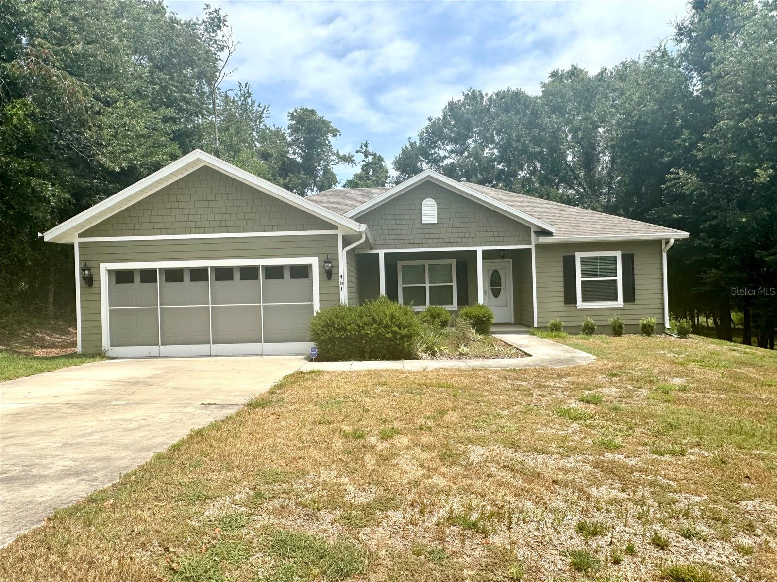 Enjoy peaceful living in a quiet community just a short drive from both Gainesville and Ocala! This beautifully
designed 3-bedroom, 2-bathroom home is nestled in the desirable Williston Highlands Golf & Country Club,
offering comfort, style, and convenience.
Energy efficiency is a highlight, with solar power included for lower utility costs. Inside, you'll find 2025 luxury
vinyl plank flooring throughout, a spacious kitchen with granite countertops, stainless steel appliances, softclose cabinetry, and a large pantry for ample storage.
The primary suite offers a luxurious escape, complete with a custom-tiled walk-in shower with a frameless
glass enclosure, a walk-in tub, and a heated bidet - perfect for both comfort and accessibility.
For those who love to relax or entertain outdoors, enjoy covered porches at both the front and back of the home
- ideal spaces to unwind or host guests year-round.