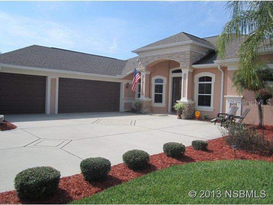 Plenty of curb appeal as you drive up to this immaculately kept lakefront home.Inviting Foyer welcomes you into this "Has Everything" residence. Wood and tile flooring throughout. Built in Entertainment Wall in Living Room with gas fireplace and faux painting. Large Kitchen with tiled Breakfast Bar and Nook with views of the pool and lake. Crown molding in the Living Room. Custom painting throughout,window treatments and professional decorating give the feel of a model home. Front Flex Room could be used as Parlor or Office. Master Bath with 2 chandeliers, doublesink granitevanity and sep. tu andchower creates a luxurious respite. Guest Bath also features granite vanity. Step out to a screened over sized Lanai and pool area and you have the perfect setting for lake front entertaining. Fully equipped Summer Kirchen and storage area, and plenty of covered sitting areas. 25' x 13'pool with lounging areas on both sides. Upgraded landscaping and large palm trees add to the tropical beauty of this setting. 3 Car Garage and large driveway. ;Water: City