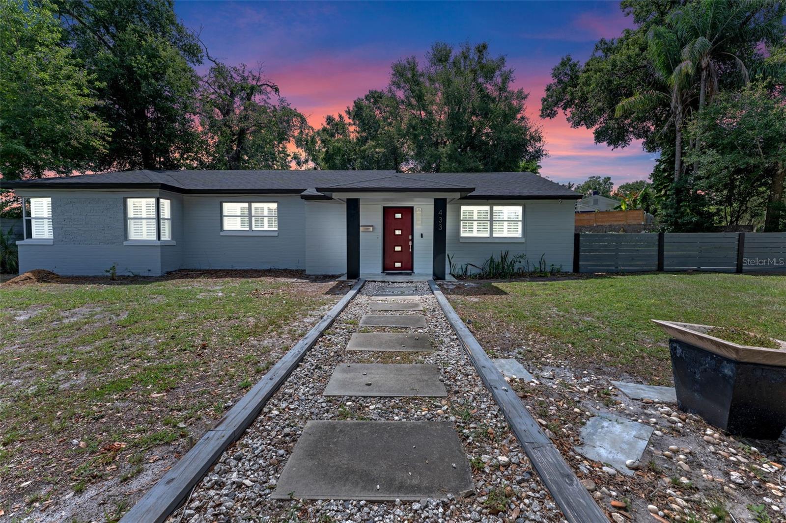 Welcome to this renovated 2-bedroom, 1-bath mid-century pool home located in the heart of Colonialtown North. Situated on a spacious corner lot, this charming property features approximately 1,154 square feet of stylish living space. Inside, you’ll find an open-concept floor plan with premium waterproof vinyl plank flooring, recessed lighting, and abundant natural light throughout. The modern kitchen is equipped with quartz countertops, stainless steel KitchenAid appliances, a reclaimed wood backsplash, and a breakfast bar that opens into the main living area—ideal for both entertaining and everyday living.
Both bedrooms offer comfort and privacy, and the beautifully updated bathroom includes a new vanity, updated tile work, and an LED backlit mirror. The home also features plantation shutters, updated lighting fixtures, and ceiling fans throughout. Step outside to your private tropical oasis, complete with a private pool, fully fenced yard, and a covered brick patio perfect for relaxing or entertaining guests.
Additional features include a one-car side-entry garage with opener, ample driveway and off-street parking, fresh interior and exterior paint, and updated R-30 attic insulation for energy efficiency. Located just minutes from Lake Eola, downtown Orlando, Mills 50, Thornton Park, and some of the city's top restaurants, breweries, and shops—this home combines modern living with unbeatable walkability and access.
Don't miss this rare opportunity to own a move-in-ready pool home in one of Orlando’s most desirable neighborhoods!
