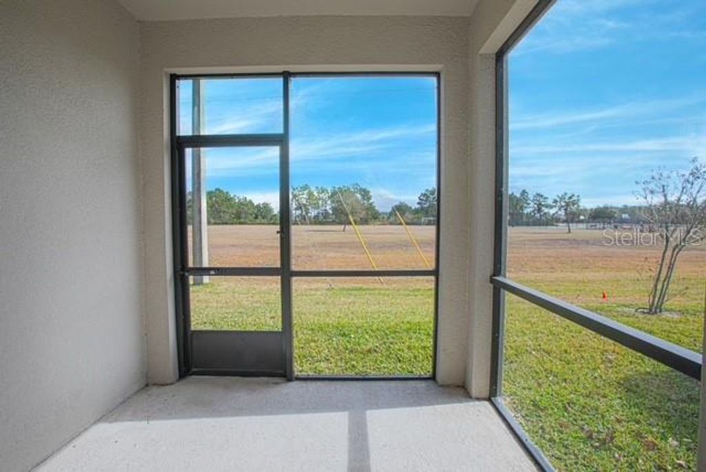 Photo of 12493 Turtle Grass Drive, Orlando, FL 32824 (MLS # S5142822)