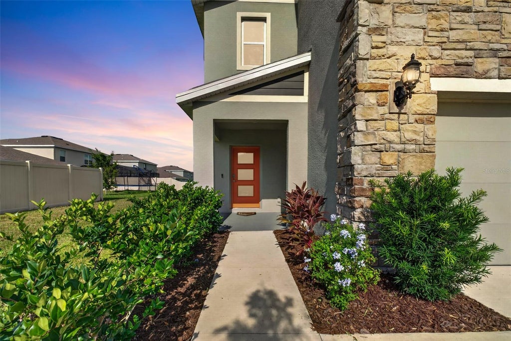 Photo of 9744 Crescent Ray Drive, Wesley Chapel, FL 33545 (MLS # TB8532029)
