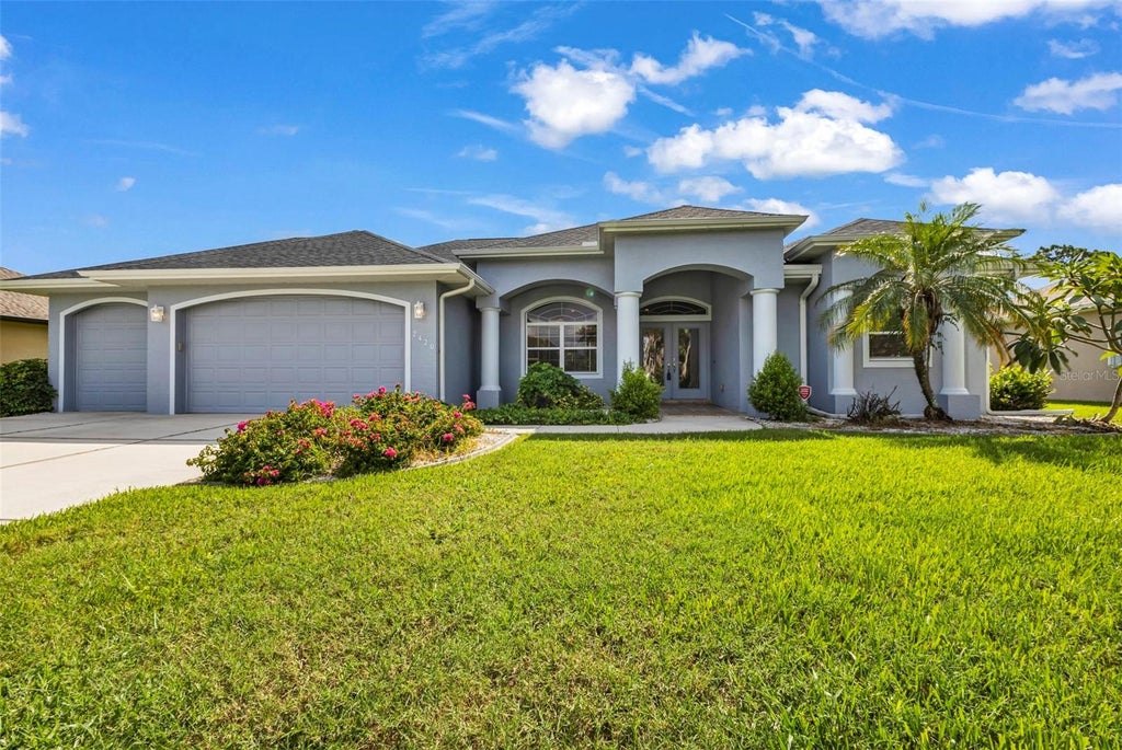 Photo of 2420 Pebble Creek Place, Port Charlotte, FL 33948 (MLS # C7529903)