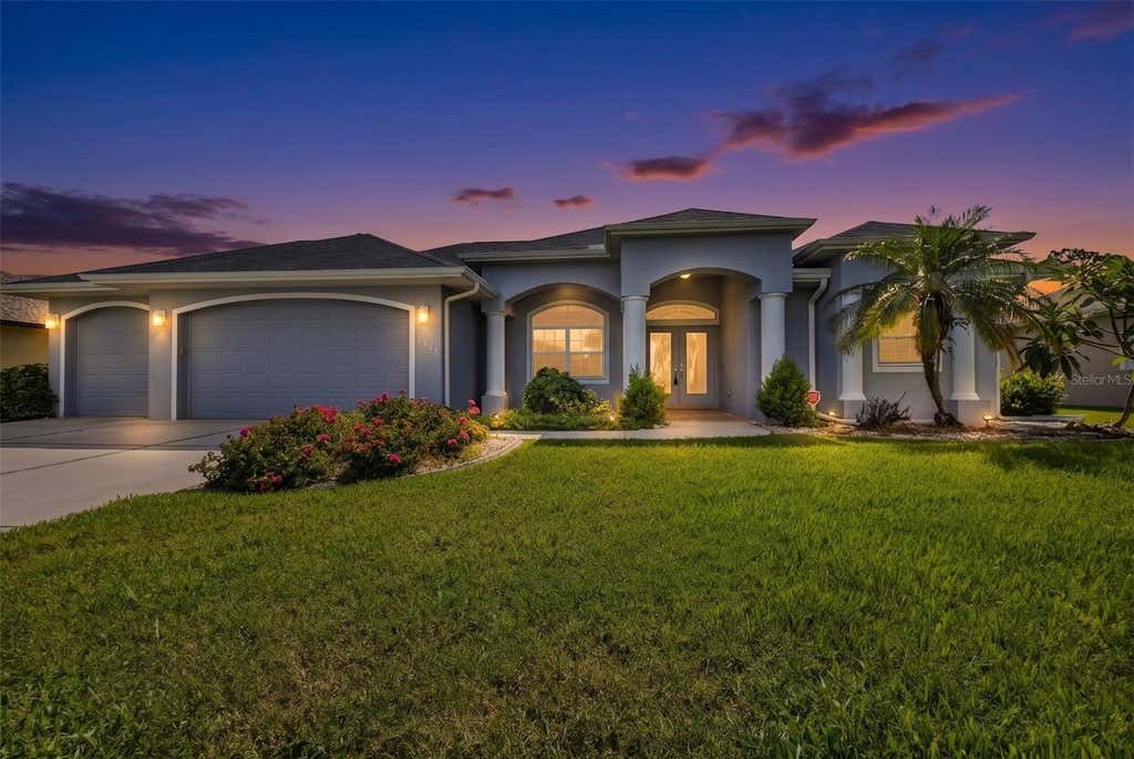 Photo of 2420 Pebble Creek Place, Port Charlotte, FL 33948 (MLS # C7529903)