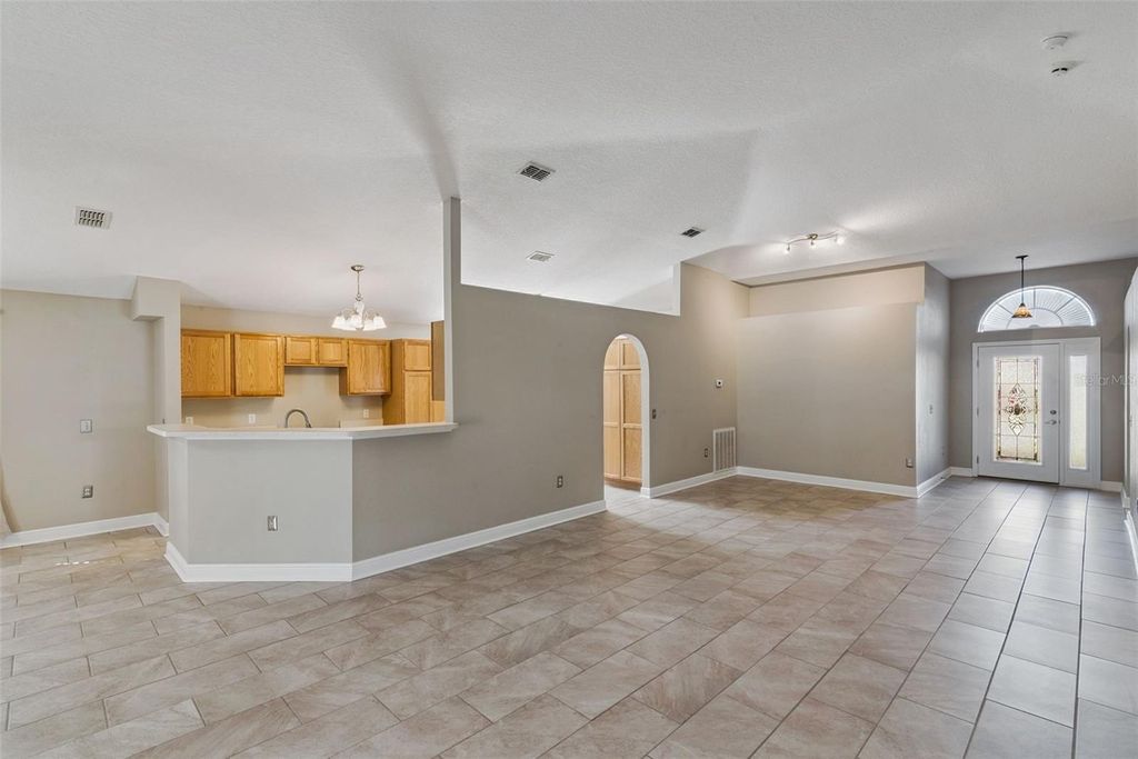 Photo of 2242 Aitkin Loop, Leesburg, FL 34748 (MLS # O6355193)