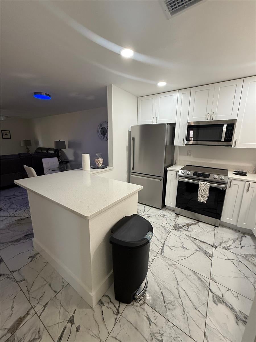 Photo of 130 Boundary Boulevard #A&amp;B, Rotonda West, FL 33947 (MLS # O6414913)