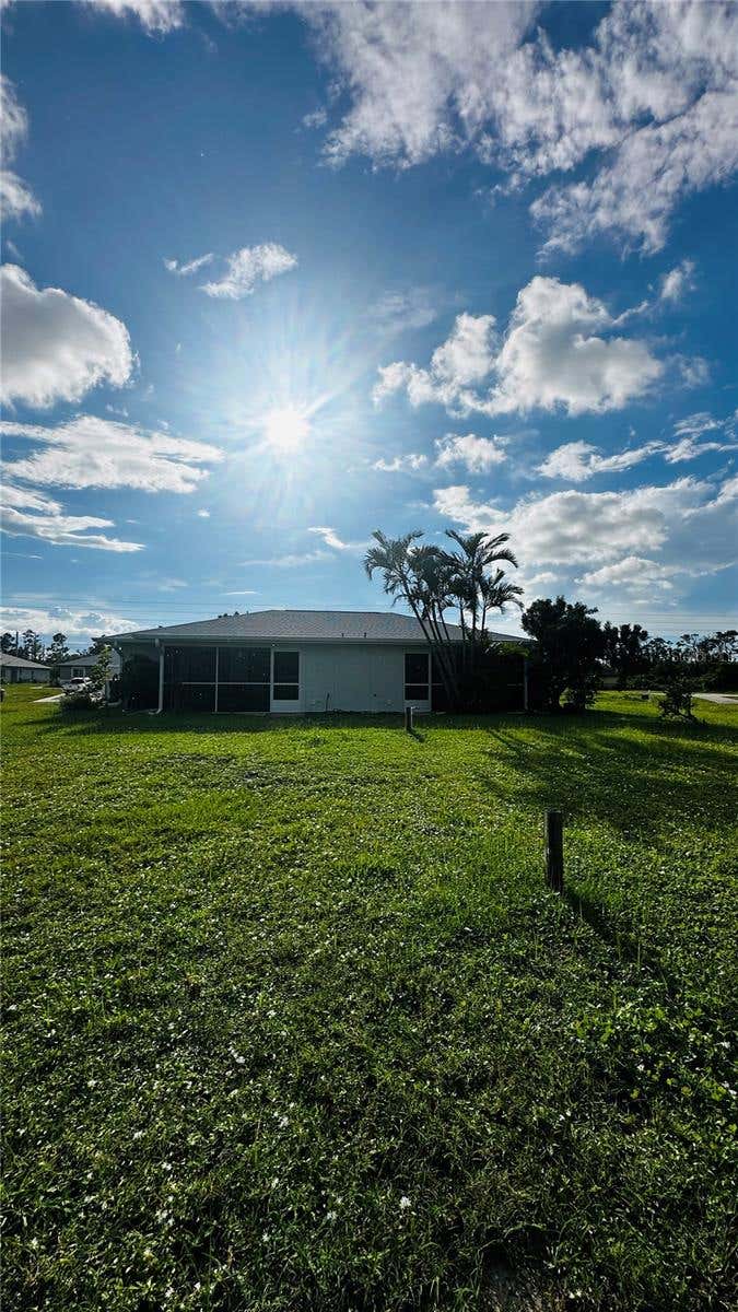 Photo of 130 Boundary Boulevard #A&amp;B, Rotonda West, FL 33947 (MLS # O6414913)