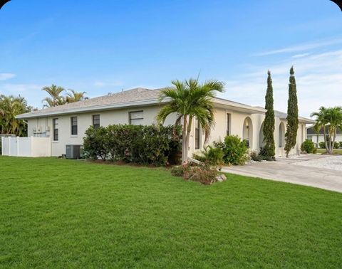 Photo of 130 Boundary Boulevard #A&B, Rotonda West, FL 33947 (MLS # O6414913)