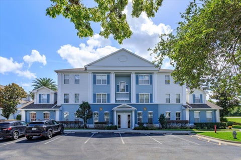 Photo of 7644 Heritage Crossing Way #102, Reunion, FL 34747 (MLS # O6420886)