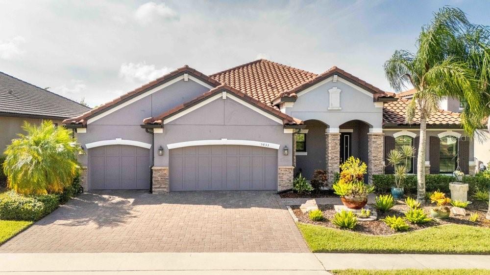 Enjoy the peacefulness of this quaint seven-home community right in the heart of the Heathrow corridor. The Florenzo is the largest single-story home at 3,248 sq ft, features 4 bedrooms, 3 and half bathrooms, a den, and three 3-car garage. The design features a 3-way split, with a large master suite on one side of the home and a second suite on the other, along with two bedrooms sharing a pool bath. This open plan features a spacious gourmet kitchen with 42" shaker cabinets, a modern stainless hood over the 5-burner gas cooktop on the island, lots of countertop space, and a built-in double wall oven and microwave. Extended throughout the living areas is light, wood plank tile. If recreation is what you seek, the Seminole-Wekiva Trail is conveniently located near the community and offers 14 miles of paved trails perfect for hikers, cyclists, dog walkers, and runners. Located right off Orange Avenue, just north of Markham, Serenity Cove has easy access to I-4, 417, and the 429 interchange.