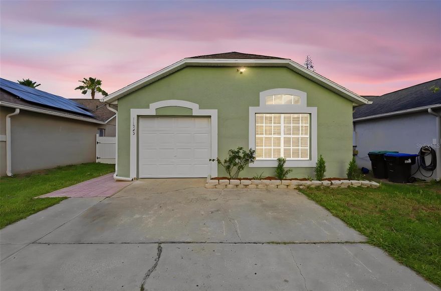 One or more photo(s) has been virtually staged. Welcome to 11525 Purple Lilac Circle, a well-maintained and inviting 3-bedroom, 2-bath home located in the desirable Whisper Lakes community in Orlando. Built in 1995 and offering approximately 1,178 square feet of living space , this single-story residence combines comfort, functionality, and value—perfect for homeowners and investors alike.

As you enter, you’re greeted by soaring vaulted ceilings and a bright, open living space that creates an airy and welcoming feel. The thoughtfully designed floor plan flows seamlessly from the living room into the dining area and kitchen, making it ideal for both everyday living and entertaining. The kitchen features ample cabinetry, countertop space, and a breakfast bar that opens to the dining area—perfect for casual meals or hosting guests.

The home offers a split-bedroom layout for added privacy. The primary suite is tucked away and includes its own private bathroom and closet space. Two additional bedrooms are well-sized and versatile, ideal for family, guests, or even a home office setup.

Step outside to enjoy one of the standout features of the home—a spacious screened-in patio along with an additional covered patio area, providing the perfect setting for outdoor dining, relaxing, or entertaining year-round. The backyard is fully fenced, offering privacy and potential for personalization.

Additional highlights include:

1-car garage with driveway parking
Central heating and cooling
Durable tile flooring in main areas
Low-maintenance 4,400 sq ft lot
Solid stucco construction and good overall condition

Located in a convenient South Orlando location, this home provides easy access to major highways, shopping, dining, and top-rated schools, including Waterbridge Elementary, Freedom Middle, and Freedom High School . Whether you're a first-time buyer, downsizing, or looking for an investment opportunity, this property checks all the boxes.