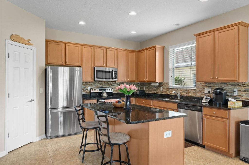 Photo of 11059 Belle Haven Drive, New Port Richey, FL 34654 (MLS # TB8517105)