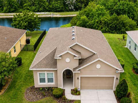 Photo of 11059 Belle Haven Drive, New Port Richey, FL 34654 (MLS # TB8517105)