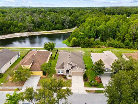 Photo of 11059 Belle Haven Drive, New Port Richey, FL 34654 (MLS # TB8517105)