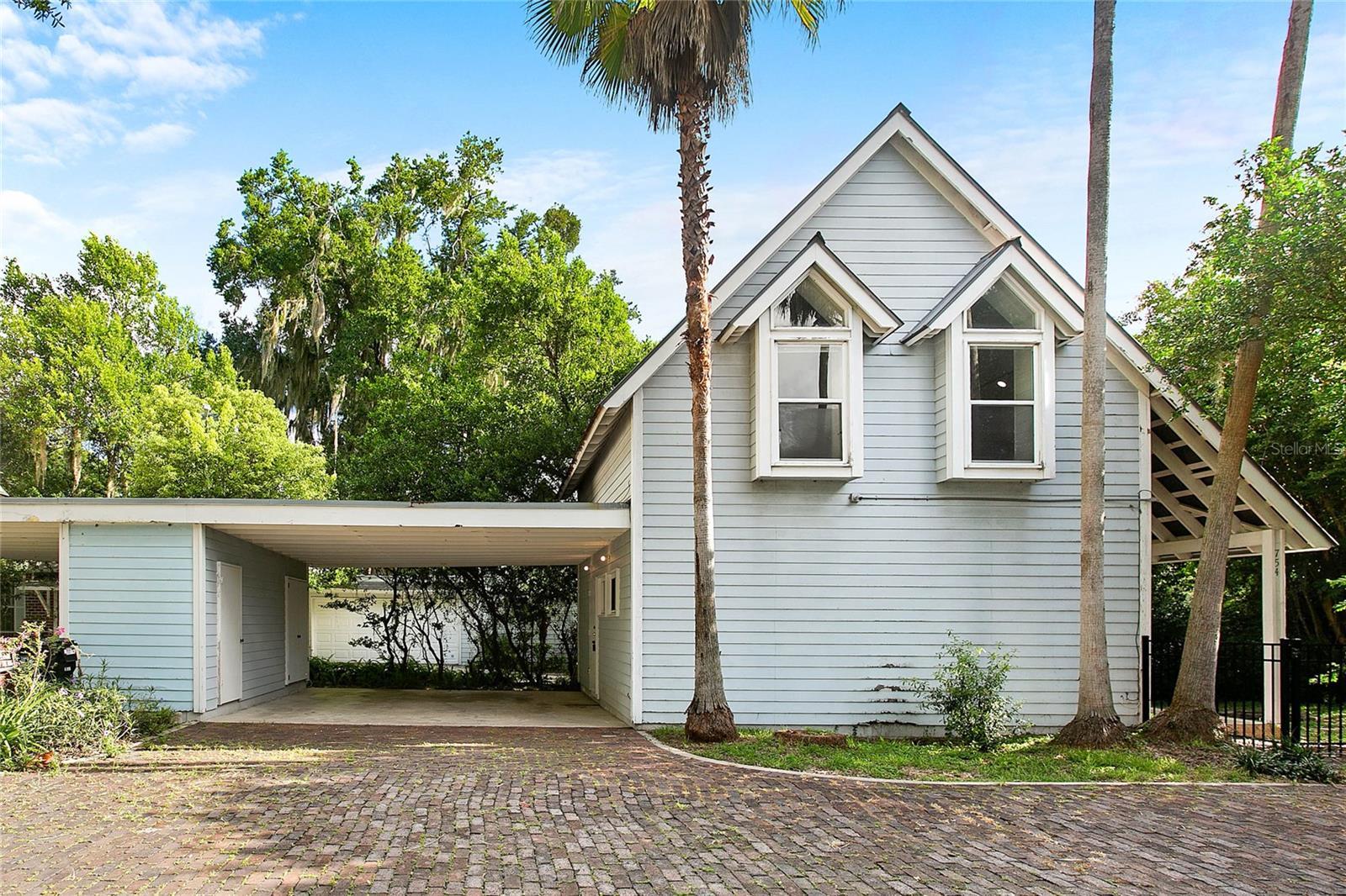 Available in early September. You will need to act quickly if you want to live in affordable luxury in College Park! You won’t be able to beat this cute, 2 story, 2 bedroom, 1.5 bath, 1030 square foot, Key West-style home. The first story features an open floor plan (great for entertaining or keeping an eye on the kids), stainless steel appliances, beautiful stone counter-tops, and half bath. The second story boasts carpeted floors, full bath, two bedrooms, and a loft area great for a home office or play space. Washer, dryer and separate storage closet are included in the covered carport, which is large enough to comfortably fit two cars. Sizable outdoor living space includes a semi-private fenced yard- perfect for pets, kids and entertaining. Located only 1.3 miles from the heart of College Park and 1.8 miles from Lake Eola, this home give you access to the best of what College Park and Orlando have to offer with easy access to I-4 and the 408 as well! Pets allowed (breed restrictions) with non-refundable $300 pet fee. No smoking allowed inside the home. Favorable background check and credit report required.
