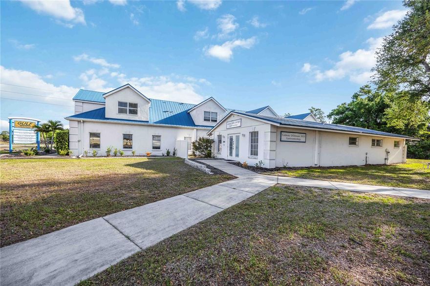 Three commercial parcels totaling approximately 1.5 acres featuring a ±9,164 square foot medical office building comprised of nine individual suites. The property is currently configured for multi-tenant use but can also accommodate a single owner-user with multiple suites. Recent capital improvements include HVAC systems replaced in 2023 and 2024. Strategically positioned on a high-visibility corner at Englewood Road (SR 776) and Keyway Place, the property offers approximately 400 feet of frontage along SR 776, along with two existing parking areas and an additional vacant parcel suitable for expanded parking or future development. Currently zoned OPI (Office, Professional, Institutional), the property allows for a variety of medical and professional uses, with potential for future rezoning to retail or mixed commercial uses, presenting a compelling opportunity for investors and developers seeking long-term upside. This site is further enhanced by its inclusion in Sarasota County’s 2030 infrastructure plan, which proposes widening Keyway Place into a dual-lane divided roadway, incorporating a signalized intersection at SR 776, and establishing a future connection to US-41. These planned improvements are expected to significantly increase traffic flow, accessibility, and exposure—driving additional residential growth and tourism traffic toward the surrounding beach communities.  Located within a rapidly expanding corridor influenced by nearby Wellen Park development, this property is well-positioned to benefit from continued population growth, increased demand for commercial services, and long-term appreciation potential.