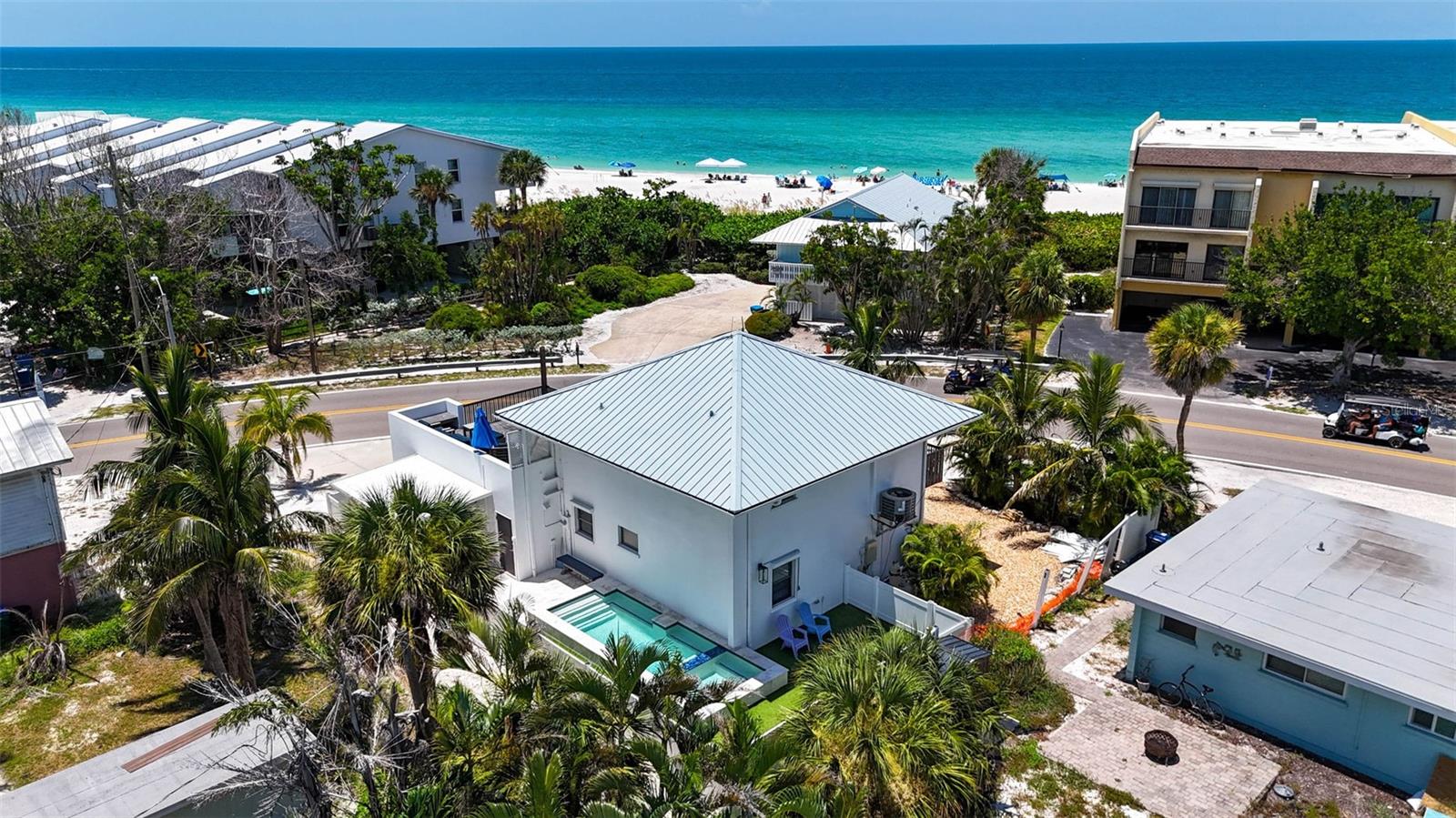 Welcome to this stunning coastal retreat, inspired by the iconic architecture of Frank Lloyd Wright, located on the sought-after Anna Maria Island. With private beach access just steps across the street and breathtaking Gulf Views from the spacious second story balcony, this home offers the ultimate island lifestyle. This two-story beauty features 3 bedrooms and 2 bathrooms, providing the perfect blend of modern comfort and coastal charm. The modern kitchen is equipped with brand new granite countertops and stainless-steel appliances, offering a sleek and functional space for everyday living. Up the stairs to the second floor, you will find the large living room designed for relaxation, with tall cleanings that create an airy, open feel. Step outside to the expansive balcony, perfect for enjoying the Gulf breeze and serene surroundings. The primary bedroom also located upstairs features a private balcony where you can unwind while taking in the island views. Additional features include a private driveway, with extra parking on the west side of the home, and a garage to store all your beach gear. After a day at the beach, rinse off in the new pool and spa, or relax under the covered patio area, all surrounded by a privacy vinyl fence and premium artificial turf for easy upkeep. AC 2 years old, metal roof in excellent condition, Impact windows, Hurricane window sliders, Pentair pool system, rainbird irrigation. This property also has a strong track record as a short-term rental, making it a fantastic investment opportunity. plus, you're just a short walk from Anna Maria Island's best restaurants, shops, and nightlife. As a Bonus you can take advantage of an assumable mortgage at a low rate of 2.75!
Don't miss out on this unique opportunity to own a piece of paradise. schedule your private showing today!