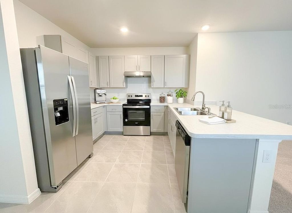 Photo of 1556 Gladewater Road, Kissimmee, FL 34744 (MLS # O6388616)