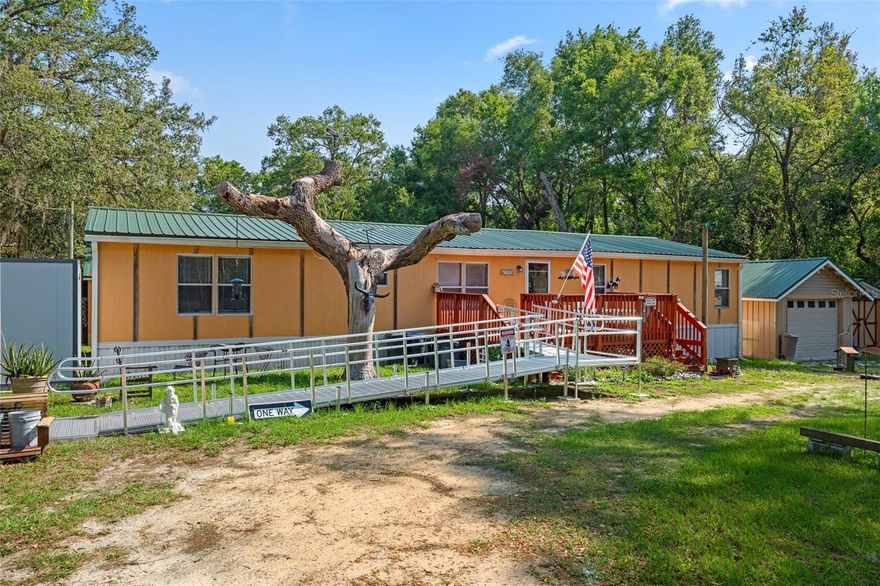 Extensively Renovated And Move-In Ready! This Unique Property Has Been Thoughtfully Updated Over The Past Several Years, Blending Rustic Charm With Modern Comfort. Starting In 2019, The Home Received A New 29-Gauge Green Metal Roof, Followed By Major Interior Renovations In 2020, Including New Subfloors, A New Front Deck, Upgraded Bathroom Vanities, Kitchen Cabinets, Countertops, Sink, And Custom Wood Paneling With Built-In Storage. From 2020 To 2021, All Exterior Walls Were Removed And Rebuilt, Including Damaged 2x4's And Insulation. The Well System Was Fully Replaced With A Deep Well Line, New Holding Tank, Pump, Casing Filter, And A Main Water Filtration System With Updated Valves. In 2021, The Home Received Gorgeous Cedar And Pine Tongue-And-Groove Ceilings And Walls In The Front Room, Along With New Windows, A Utility Sink, And Complete Removal Of The Third Bathroom To Make Room For Additional Living Space. A High-Efficiency Bryant 4-Ton, 3 SEER A/C System Was Installed For Year-Round Comfort. In 2022, All Flooring Was Upgraded To Luxury Vinyl Plank Throughout, Along With All New Ductwork. The Renovations Continued In 2023 With More Cedar Tongue-And-Groove Ceilings And Walls, New Outlets, Light Fixtures, Ceiling Fans, And A Full Remodel Of Both Bathrooms Featuring Purple Board In Wet Areas, New 2x4 Framing, Subflooring, Toilets, Tub, Tile, And Drywall. In 2024, A Beautiful Back Office Was Created With Aged White Wood Walls, New Electrical, And Updated Flooring. All Interior Bedroom And Bathroom Doors Were Replaced With Lockable Options. A Custom 16'x28' Garage Was Built With A Green Metal Roof, Loft, Full Wiring, New Power Box, 30-50 Amp Outlet, And Lighting. A 13'x20' Shed Was Also Constructed With Heavy-Duty Flooring, Electrical Outlets, GFCI, Lighting, And A Matching Metal Roof. In 2025, The Older Shed Received A New Metal Roof And Fresh Exterior Paint, And The Septic Tank Was Cleaned And Serviced, Complementing An Earlier Service In 2019. This Home Is Truly One-Of-A-Kind With Exceptional Craftsmanship, Endless Upgrades, And No HOA—Offering Comfort And Flexibility For A Variety Of Lifestyles. The Property Across The Street Is Also Available, .57 Acre Vacant Lot! Zoned For A Modular Home, Single Family Residence, Or Duplex—Offering Incredible Flexibility To Build Your Dream Property Or Investment Project. Call Today To Schedule Your Showing!!