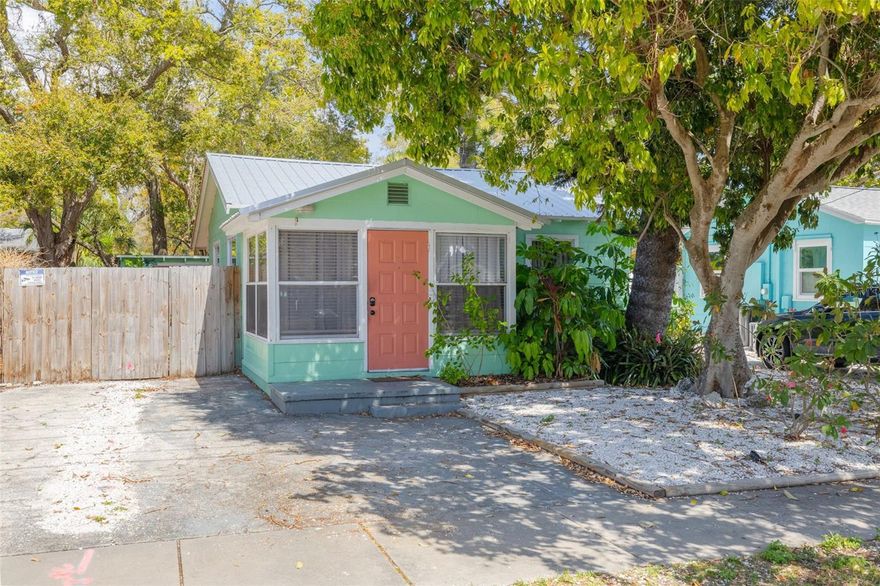 Bring your Beach Bungalow dreams to life with this charming Gulfport retreat! This 2-bedroom, 1-bath home features an inviting open-concept layout filled with natural light and is completely turnkey—perfect as a full-time residence, vacation home, or income-producing investment. Currently operating as a successful Airbnb for the past three years, this property offers immediate short-term rental potential, yet feels just as ideal for those looking to call Gulfport home. Enjoy peaceful front-yard views of Tangerine Park, or take a short two-block stroll to Tomlinson Lake Park and Playground. Located in Flood Zone X (no flood insurance required) and just a quick bike ride to Gulfport’s vibrant waterfront downtown, where you’ll find eclectic galleries, restaurants, boutique shops, and live music year-round. Major updates provide peace of mind, including a full remodel in 2021, new HVAC and metal roof in 2022, and new windows in 2025. Step outside to enjoy Florida living at its best. The fully fenced backyard offers privacy and space for pets, along with a dedicated outdoor dining area and cozy firepit—perfect for entertaining. A rear storage shed provides room for lawn equipment and beach gear and houses a full-size washer and dryer. Whether you're looking to expand your real estate portfolio or settle into a laid-back Gulfport lifestyle, this charming bungalow offers the best of both worlds. Don’t miss this opportunity!
