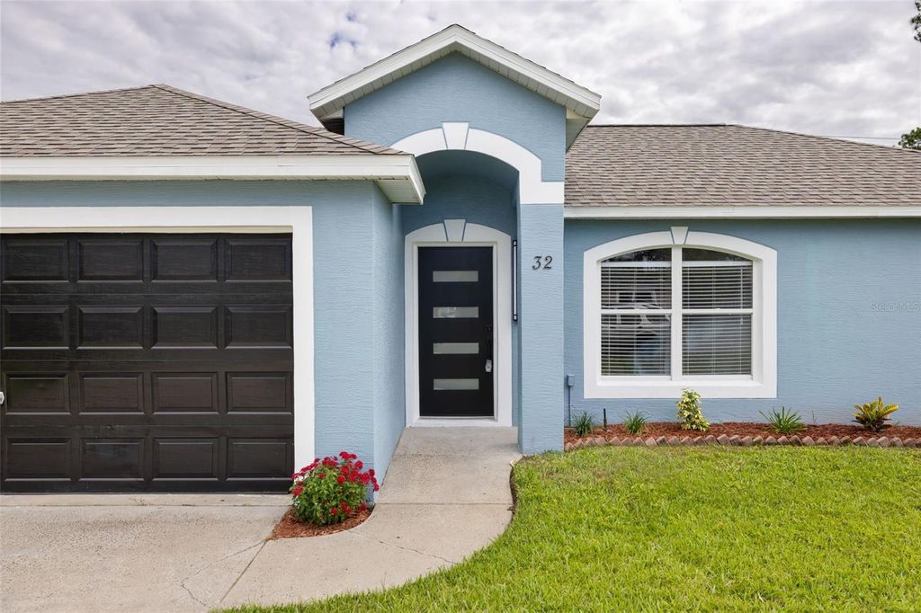 Photo of 32 Emerson Drive, Palm Coast, FL 32164 (MLS # FC313574)