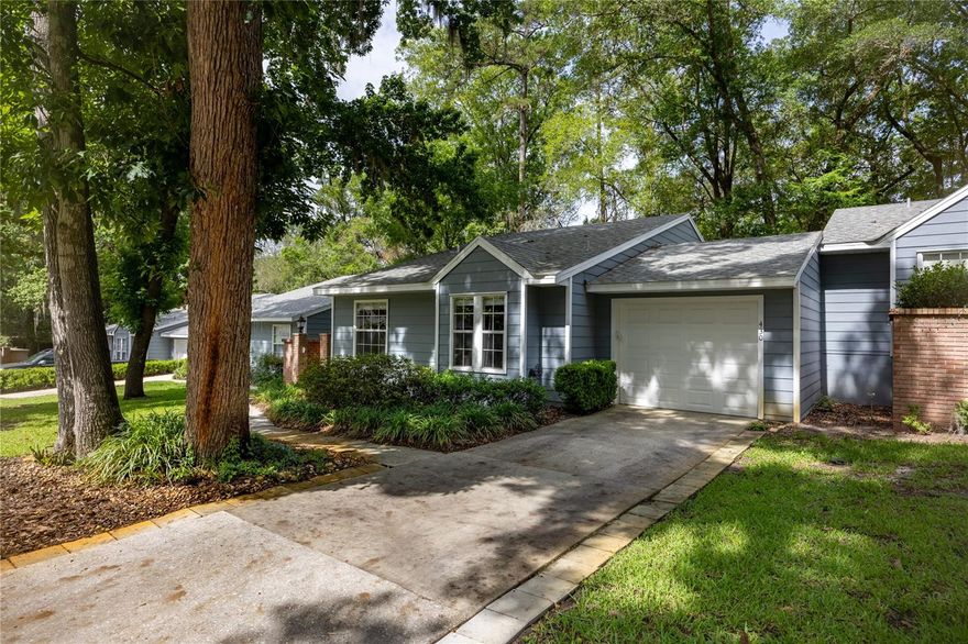 Welcome to this beautifully maintained 2-bedroom, 2-bathroom condominium in the desirable Mill Pond community. Ideally situated on a quiet cul-de-sac directly across from Gainesville Health & Fitness, this move-in-ready home offers 1,102 square feet of comfortable single-level living with an exceptional combination of convenience, natural beauty, and low-maintenance ownership.

Inside, you'll find a bright and inviting open floor plan featuring vaulted ceilings, luxury vinyl plank flooring installed in 2024, ceramic tile in the kitchen and bathrooms, and no carpet throughout. Large windows fill the home with natural light while showcasing peaceful wooded views and the surrounding landscape. The spacious living area features recessed lighting and French doors that open to a screened porch overlooking a private wooded backdrop, creating the perfect space to relax and enjoy the outdoors.

The kitchen opens seamlessly to the dining area and includes stainless steel appliances, recessed lighting, ample cabinetry, and a sunny eat-in space. The primary suite offers two large windows, abundant natural light, and a spacious walk-in closet. Recent improvements include updated bathroom and kitchen faucets, refreshed paint, updated electrical switches and outlets, and ceiling fans throughout.

A charming brick courtyard entry enhances the home's curb appeal, while the attached one-car garage provides additional storage and convenience. The condominium association offers outstanding value with exterior maintenance, lawn care, roof maintenance and replacement, termite and pest treatment, and access to community amenities including a swimming pool, clubhouse, walking paths, tennis courts, and beautifully maintained common areas. The roof was replaced in 2023.

Conveniently located near shopping, dining, medical facilities, parks, and major roadways, this home is also near public transportation options, including nearby bus service with convenient access throughout Gainesville. Whether you're seeking a primary residence, a second home, or an investment opportunity, this well-appointed condominium offers comfort, convenience, and a desirable location in one of Gainesville's established communities.