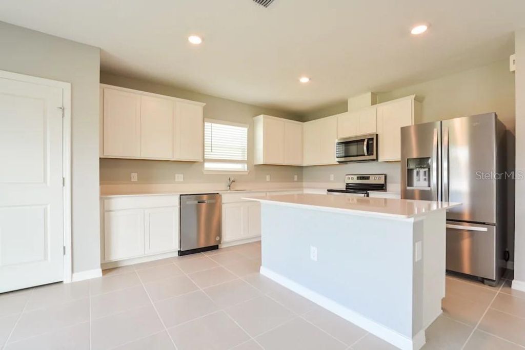 Photo of 421 Waterford Drive, Lake Alfred, FL 33850 (MLS # TB8475375)