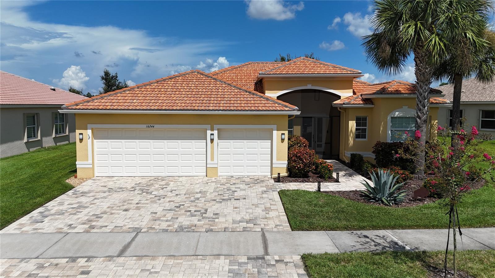 Captivating Home in Valencia Lakes - A 55+ Resort-Style Haven! Welcome to your dream retreat in the heart of Valencia Lakes! This stunning 3 bedroom, 2 bathroom home boasts breathtaking water views that greet you upon entry. The spacious kitchen seamlessly flows into the living area, perfect for entertaining, while a cozy sitting room offers a serene escape. Step outside to your expansive screened-in lanai, recently upgraded to provide the ideal space for outdoor gatherings, all overlooking a picturesque pond. Inside, enjoy the elegance of large tile floors, a generous master suite with dual vanity sinks, and thoughtfully designed custom closets. Recent enhancements include modern over and under cabinet LED lighting, new ceiling fans, and fresh interior paint ensuring a bright and inviting atmosphere. The AC is only 2 years old, and a new dishwasher and built-in oven means you can relax and enjoy your new home without worry. Additional updates include new driveway pavers, exterior paint, garage floors professionally epoxied, custom window treatments in the living, dining room and eating area, new landscaping, grab bars in the shower and a reverse osmosis water filter. Nestled within one of the most vibrant 55+ communities in the Greater Tampa Bay area, Valencia Lakes offers a resort-style lifestyle with a 40,000 sq. ft. clubhouse, 24-hour fitness center, multiple pools, tennis courts, bistro, pickleball, bocce ball, live shows, arts and crafts, cooking classes, walking paths , numerous clubs and activities to keep you engaged. Don’t miss the chance to experience this active lifestyle – schedule your tour today!