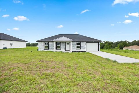 Photo of 13098 SW 106th Place, Dunnellon, FL 34432 (MLS # OM706832)