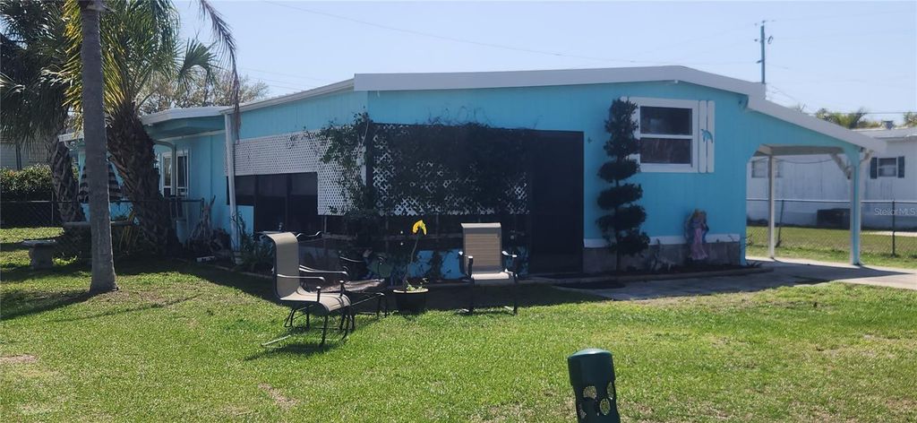 Photo of 324 Calle Liana, Englewood, FL 34224 (MLS # D6146508)