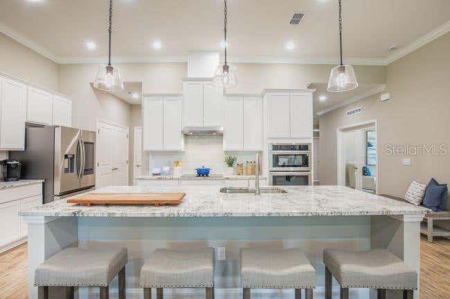 Photo of Tbd Old Squaw Avenue, Weeki Wachee, FL 34614 (MLS # O6437241)