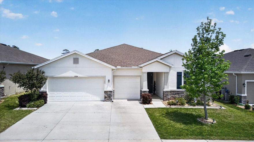 Welcome to your dream home in Spring Hill, located in the highly sought-after Barrington at Sterling Hills community — and best of all, NOT in a flood zone! This stunning 4-bedroom, 3.5-bath home was built just 5 years ago and offers the perfect blend of modern style, space, and flexibility.

From the moment you step inside, you’re greeted by an enormous Great Room featuring soaring 12-ft tray ceilings all opening to a large screened lanai—perfect for entertaining or relaxing year-round. The spacious split-bedroom layout provides privacy for everyone and makes this home ideal for multigenerational living.

The gourmet kitchen is truly the heart of the home and a chef’s dream, featuring granite countertops, stainless steel appliances, a large island with a breakfast bar, a walk-in pantry, and a generous breakfast room for casual dining.

The luxurious primary suite is privately situated on one side of the home and showcases tray ceilings, a large walk-in closet, and a spa-like bathroom with double sinks, a spacious shower, and an oval soaking tub. On the opposite side, bedrooms two and three share a convenient Jack-and-Jill bathroom.

Need space for in-laws or adult children? This home delivers! Down the hall past the 3-car garage, you’ll find a grand private suite complete with its own living room, equipped for installation of a kitchenette (perfect as a family room or game room), a fourth bedroom, and a third full bathroom. A large laundry room separates this wing from the main home, offering incredible flexibility and privacy.

Residents enjoy amazing community amenities just down the street, including a clubhouse, two community pools, a splash pad, fitness center, party room, walking trails, lighted tennis courts, basketball courts, and a dog park. With easy access to the Suncoast Parkway, you can be in Tampa in minutes.

This spacious, modern home truly has it all—don’t miss your opportunity to make it yours!