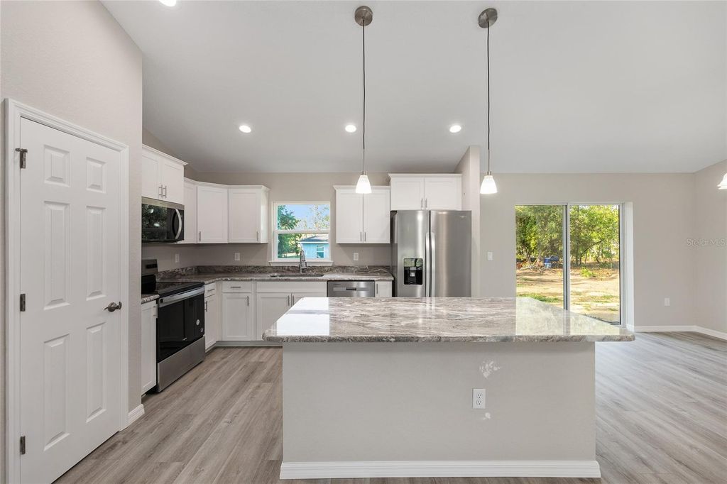 Photo of 2428 W Newhope Lane, Dunnellon, FL 34434 (MLS # OM707614)